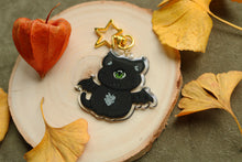 Cargar imagen en el visor de la galería, Llavero de cycat con alas de murciélago (con purpurina) (versión halloween)