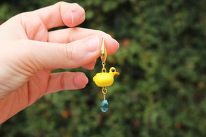 “Like a duck in water” earrings