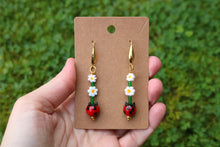 Load image into Gallery viewer, Ladybug and daisy earrings
