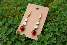 Load image into Gallery viewer, Ladybug and daisy earrings
