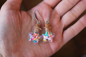 Bottle earrings with colored stars