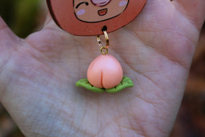 Wooden keychain "Troll in peach costume"